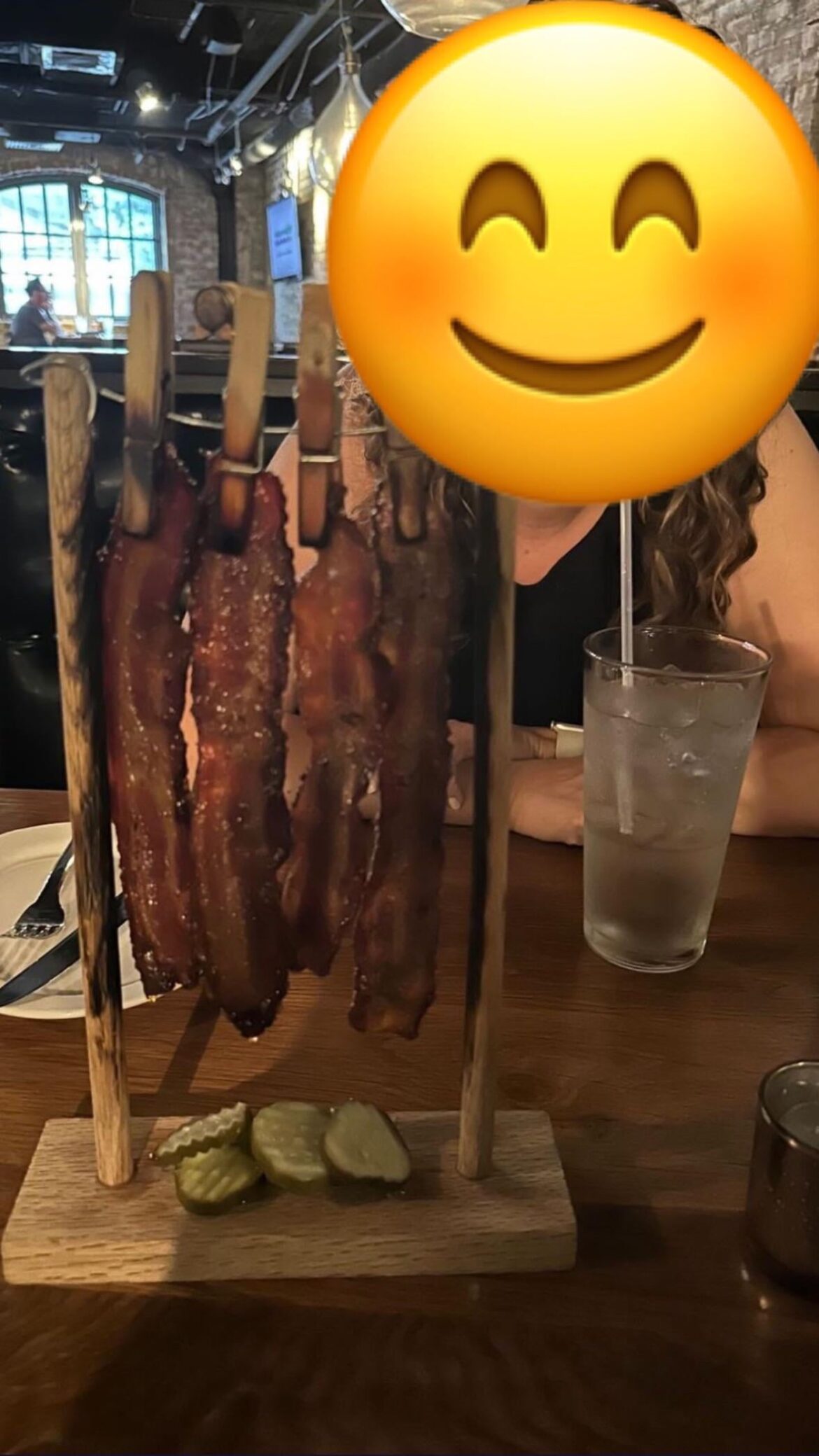 Bacon hanging from clothes pins