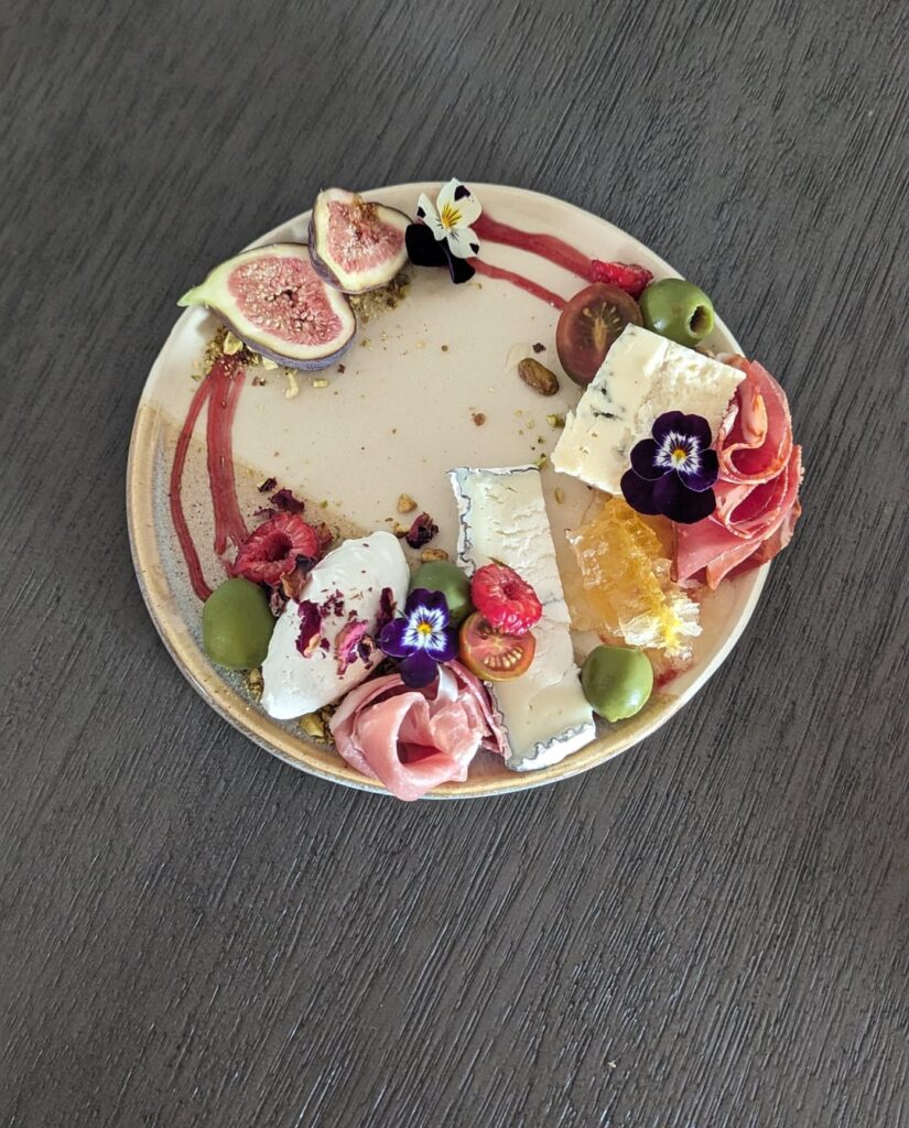 Humboldt Fog, Chevre, Point Reyes Blue with Raspberry Coulis, Fig, Rose, Honeycomb and other favorite sides for a cheese plate.