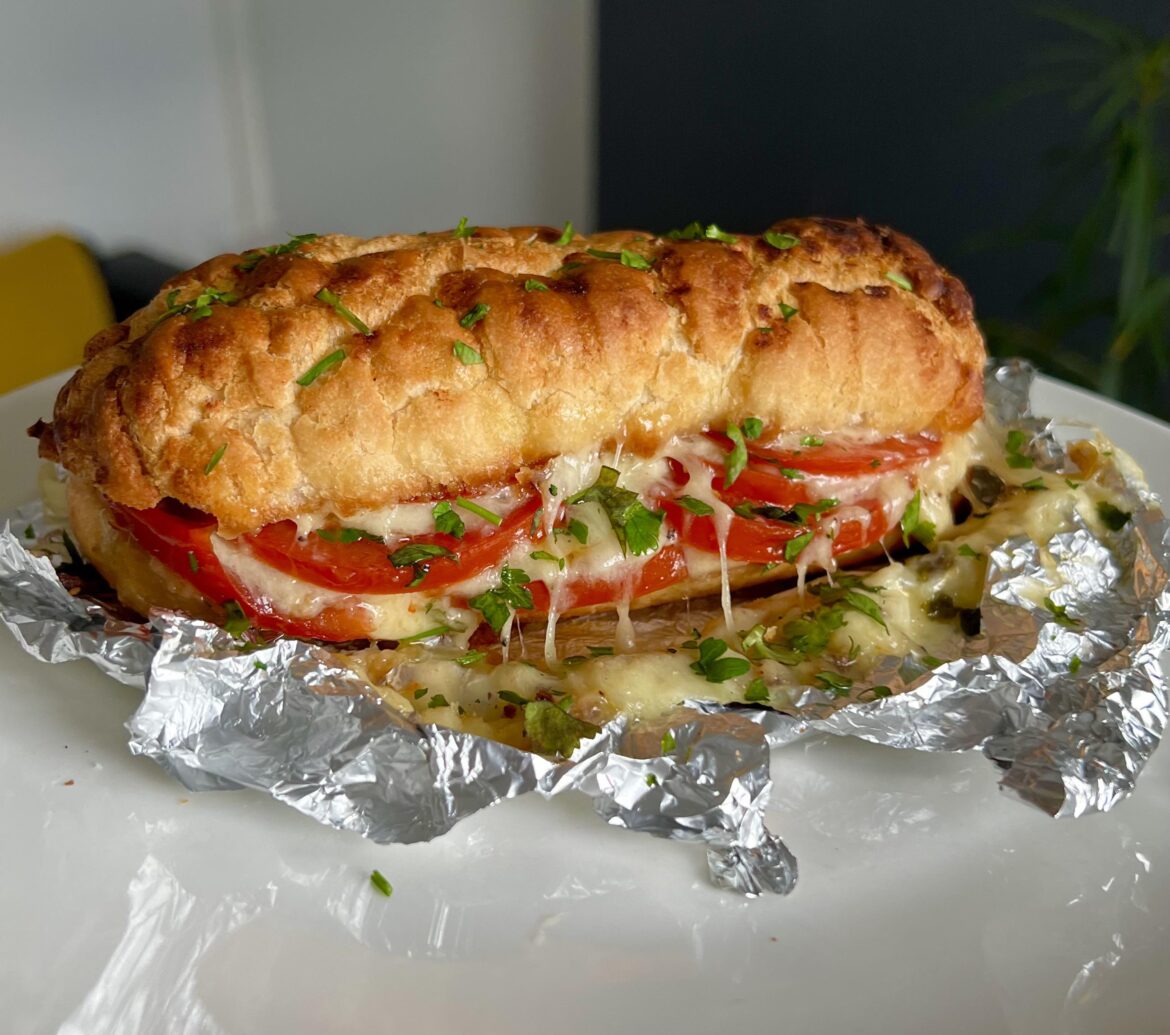 Cheddar, mozzarella and tomatoes on tiger bread.