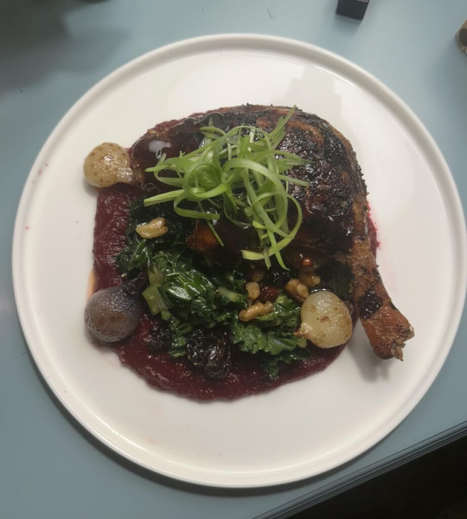 Roasted duck leg, beet puree, kale salad, sautéd pearl onions, honey balsamic and orange sauce