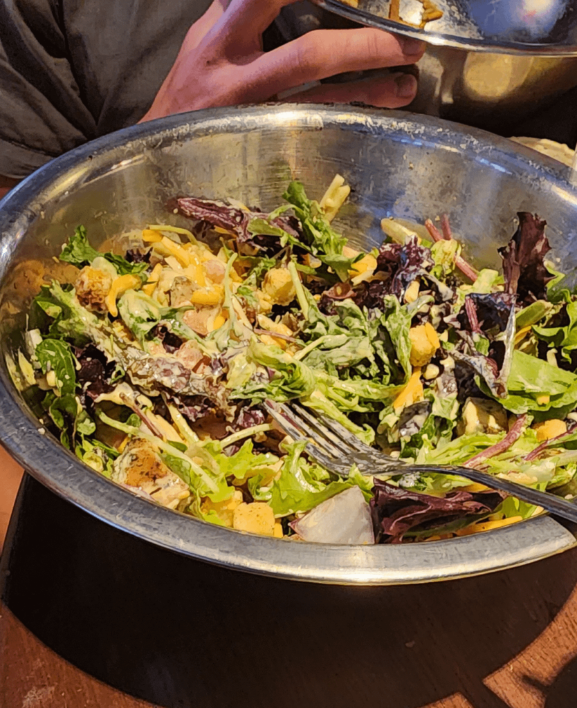 Salad in a mixing bowl.