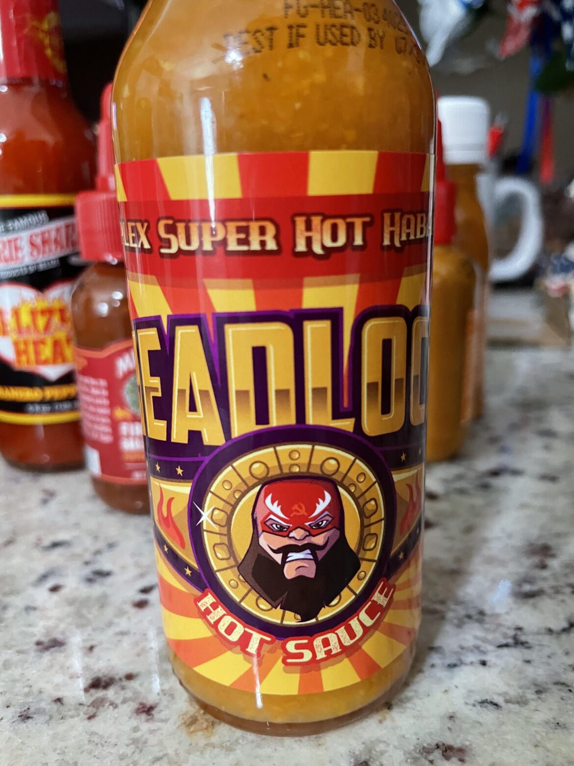 Give this one a pass at Walmart - Headlock Hot Sauce