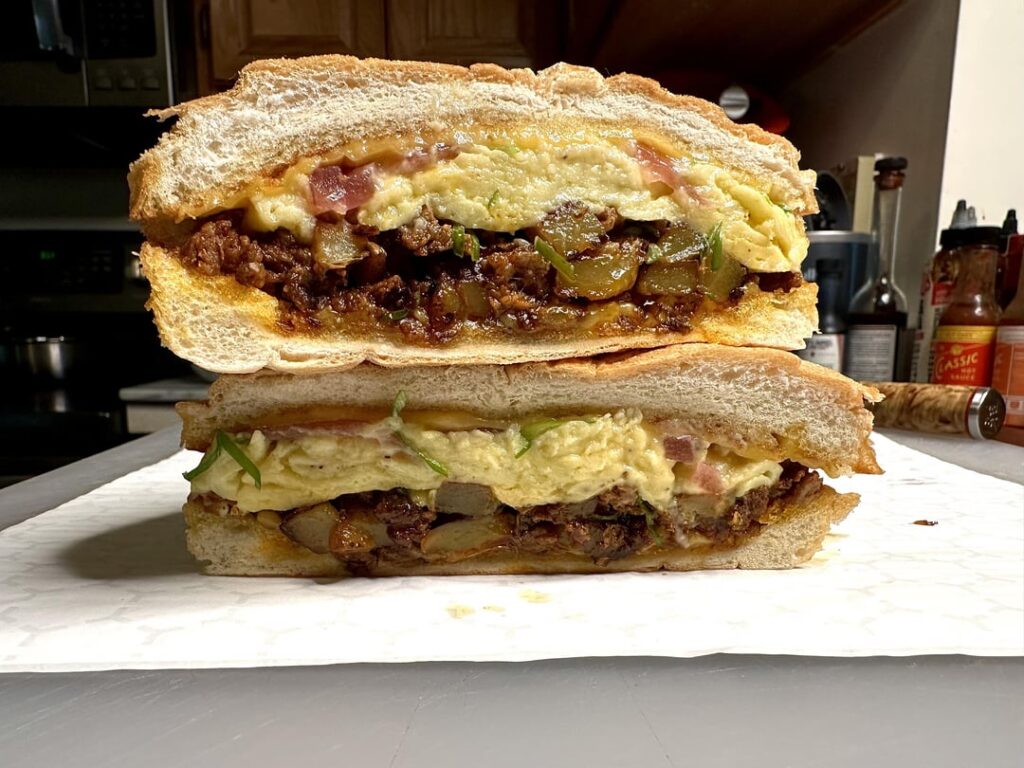 Chorizo, potato, egg, and cheese breakfast sandwich.