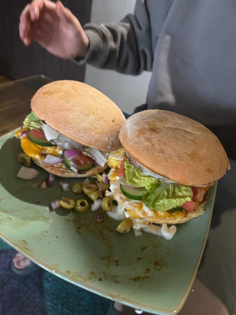 Lil' sis made us her first cheeseburgers ever (yup, there is meat inside)