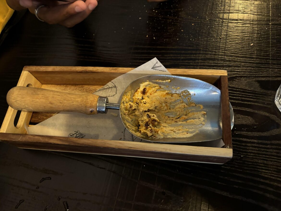 Hummus served in a garden trowel. Newcastle, UK.