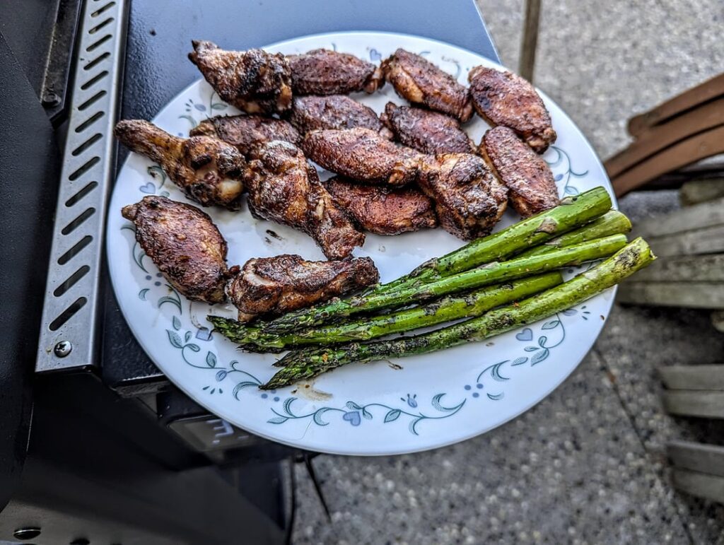 Weber Searwood wings and asparagus