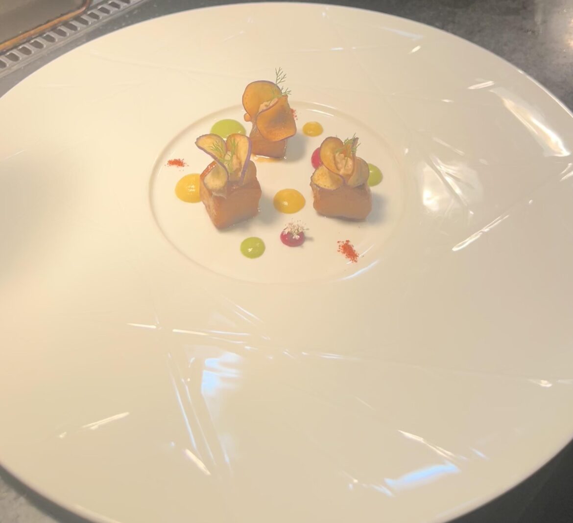 Soy glazed aubergine, daikon/turmeric curry, red beet curry, green bell pepper/coriander curry, eggplant caviar, and curry eggplant chips, espelette pepper