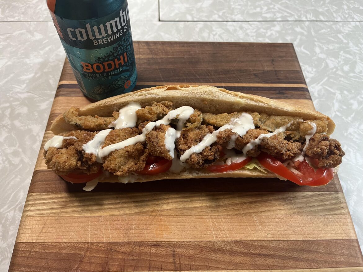 Homemade pickle chicken and fried pickle spears with Ranch sandwich.