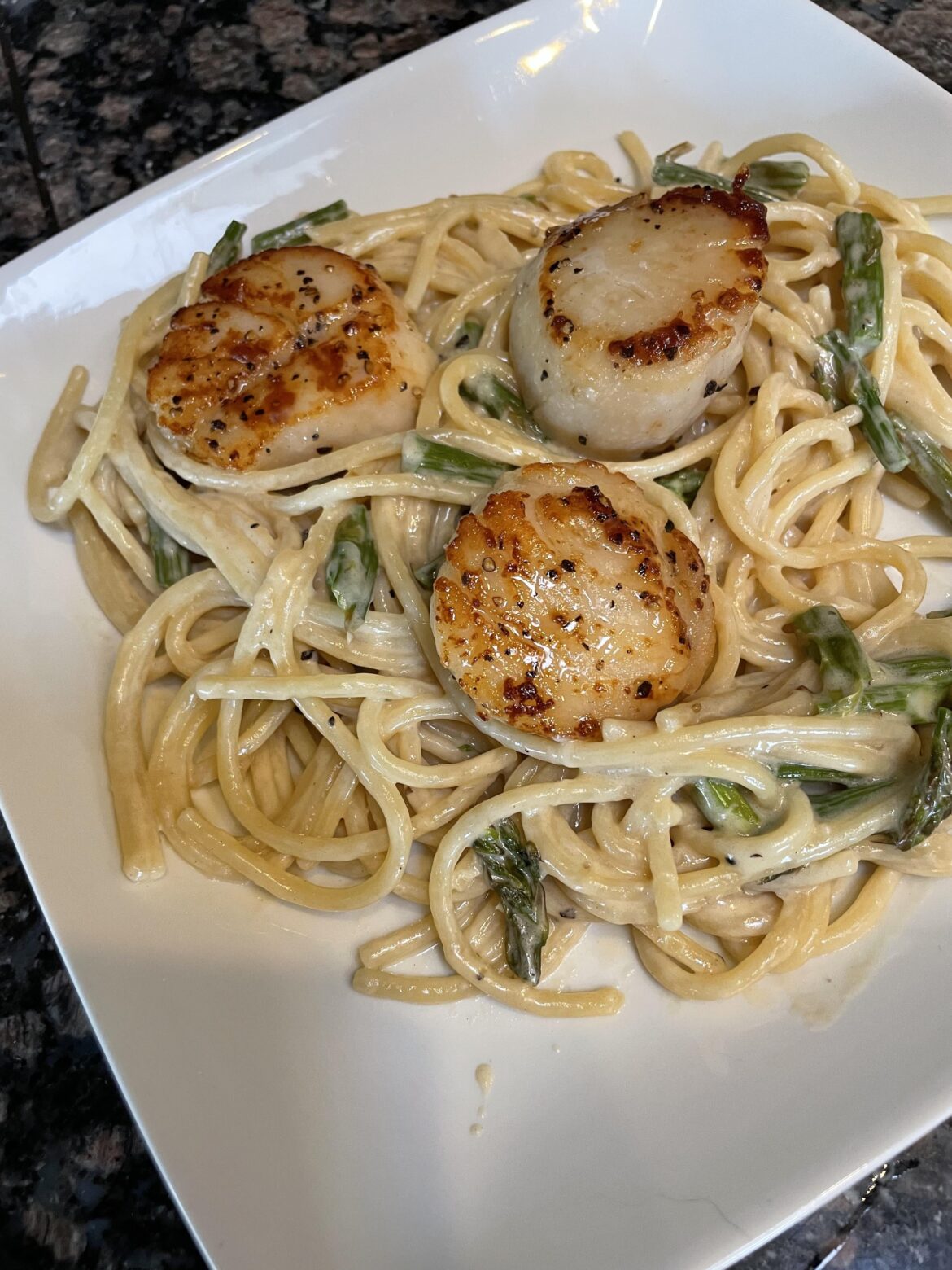 Buttery Scallops with Parmesan Spaghetti.