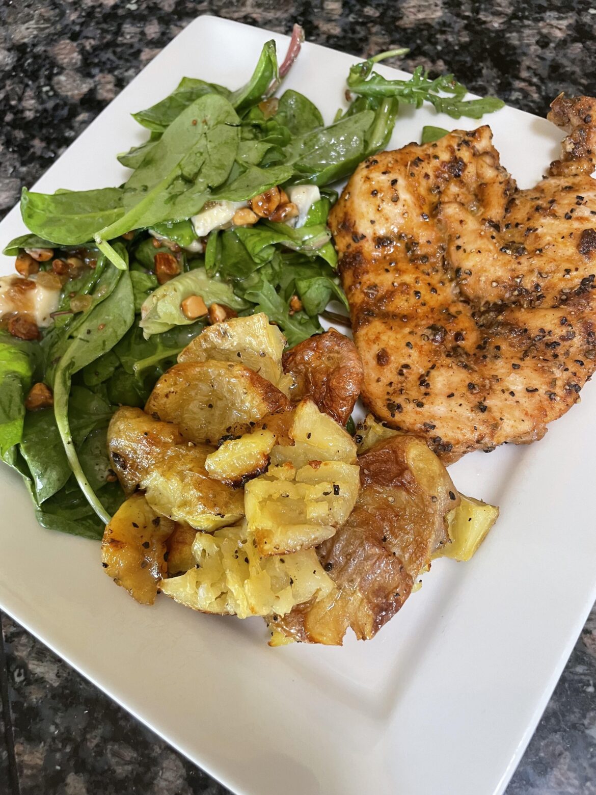 Aussie Spiced Chicken with crispy potatoes. I skipped the truffle mayo and added a few things to the salad plus a pear/ Gorgonzola vinaigrette . Very tasty