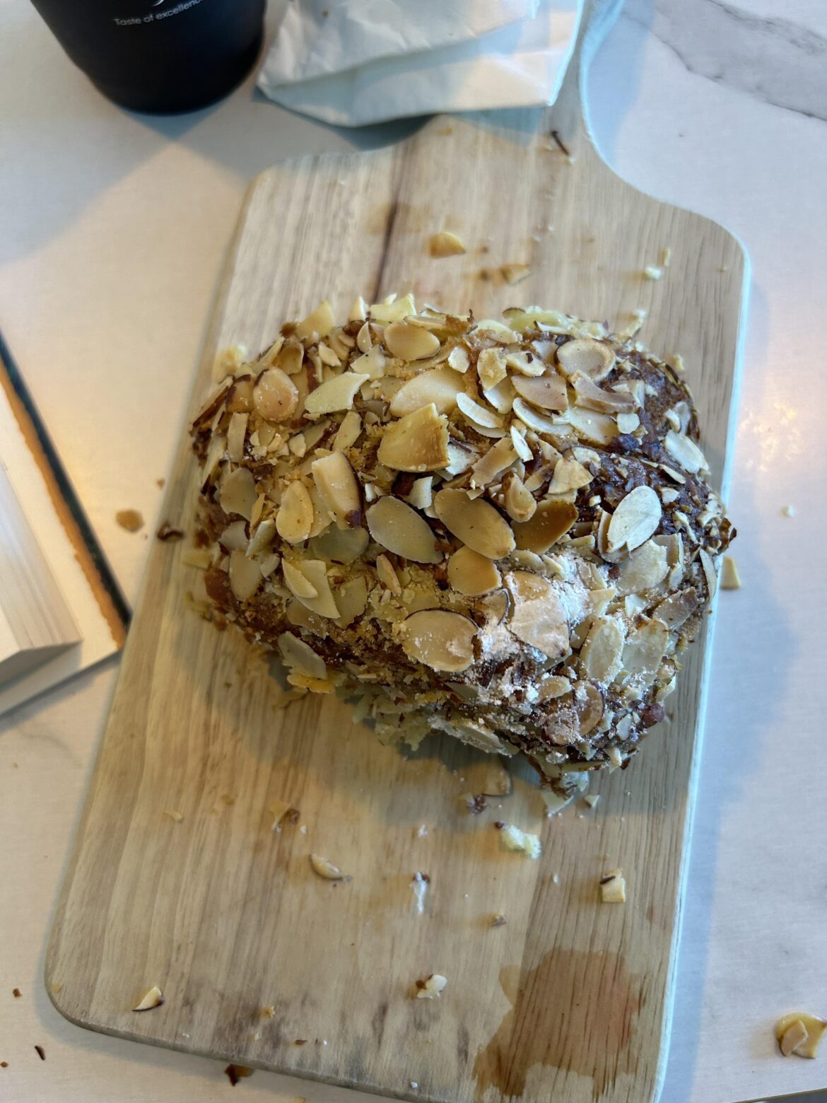 Love this cafe but they serve everything on tiny, narrow wooden cutting boards. It’s impossible to eat an almond croissant without getting crumbs everywhere…