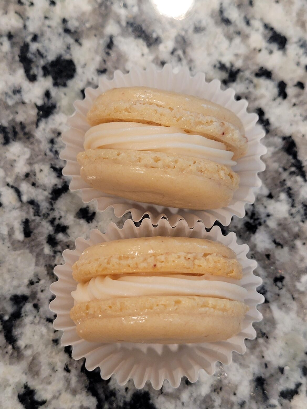 Looking for tips on naturally colored macarons. I use a few drops of a liquid and beet root powder but it loses its color as it bakes and they stick to the pan in the center ALWAYS. I NEED TIPS.