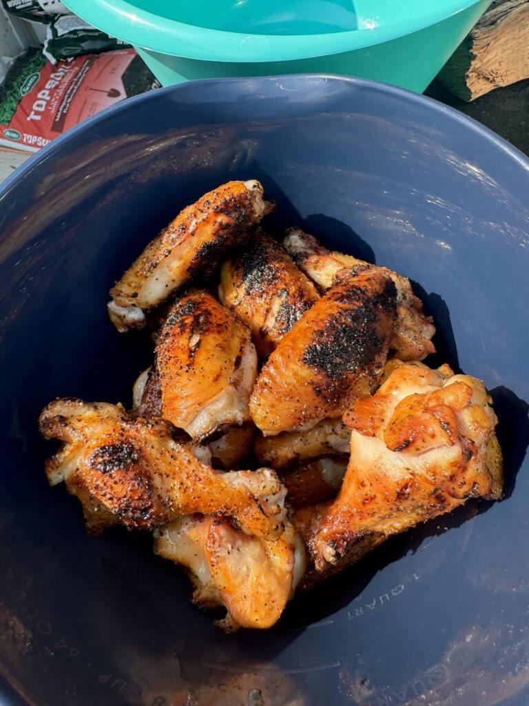 Hot wings on the woodwind pro. Smoked at 225 with apple chunks for about an hour. Touched to the flame on the sear box to finish.