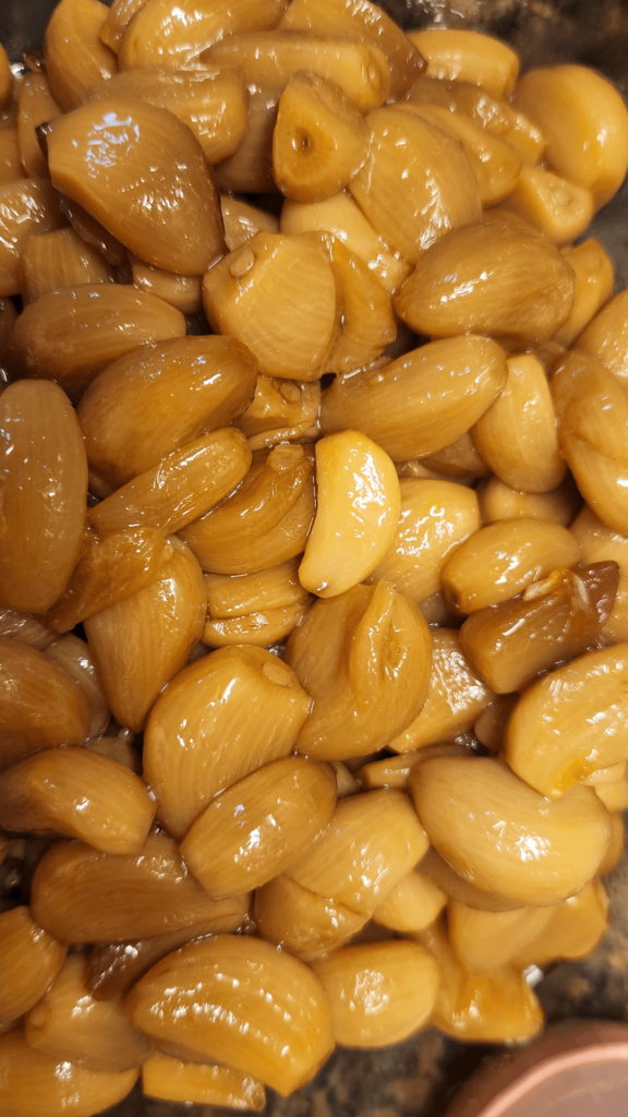 Where do you typically use your garlic confit in your recipes?