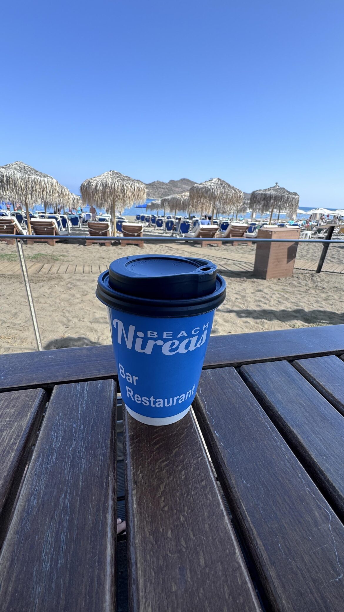 Crete. No shirt, no shoes, awesome service and me great coffee