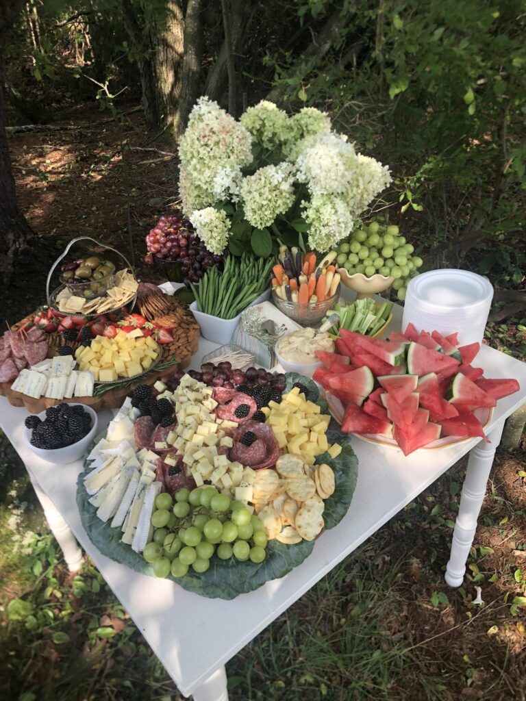 Couple of table for friends outdoor wedding. Cocktail hour