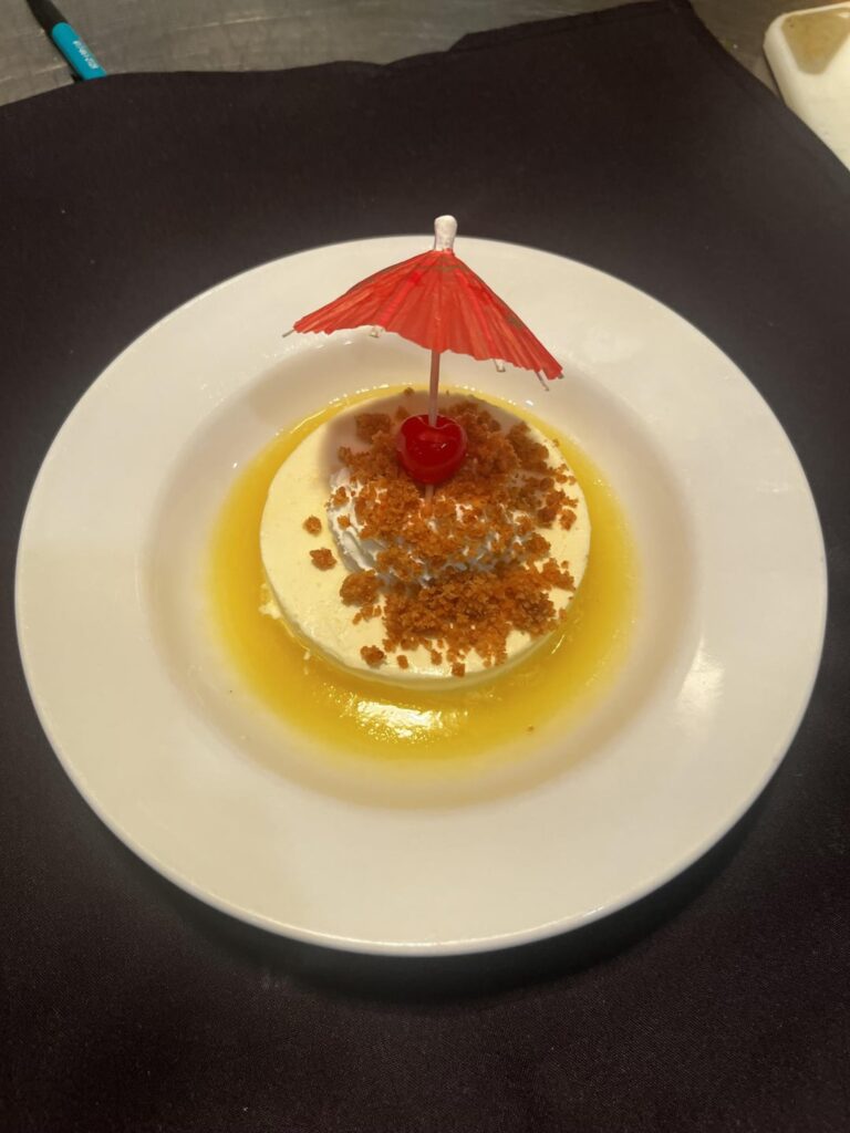 Pinã colada semifredo, pineapple coulis, coconut foam, brown sugar crumble