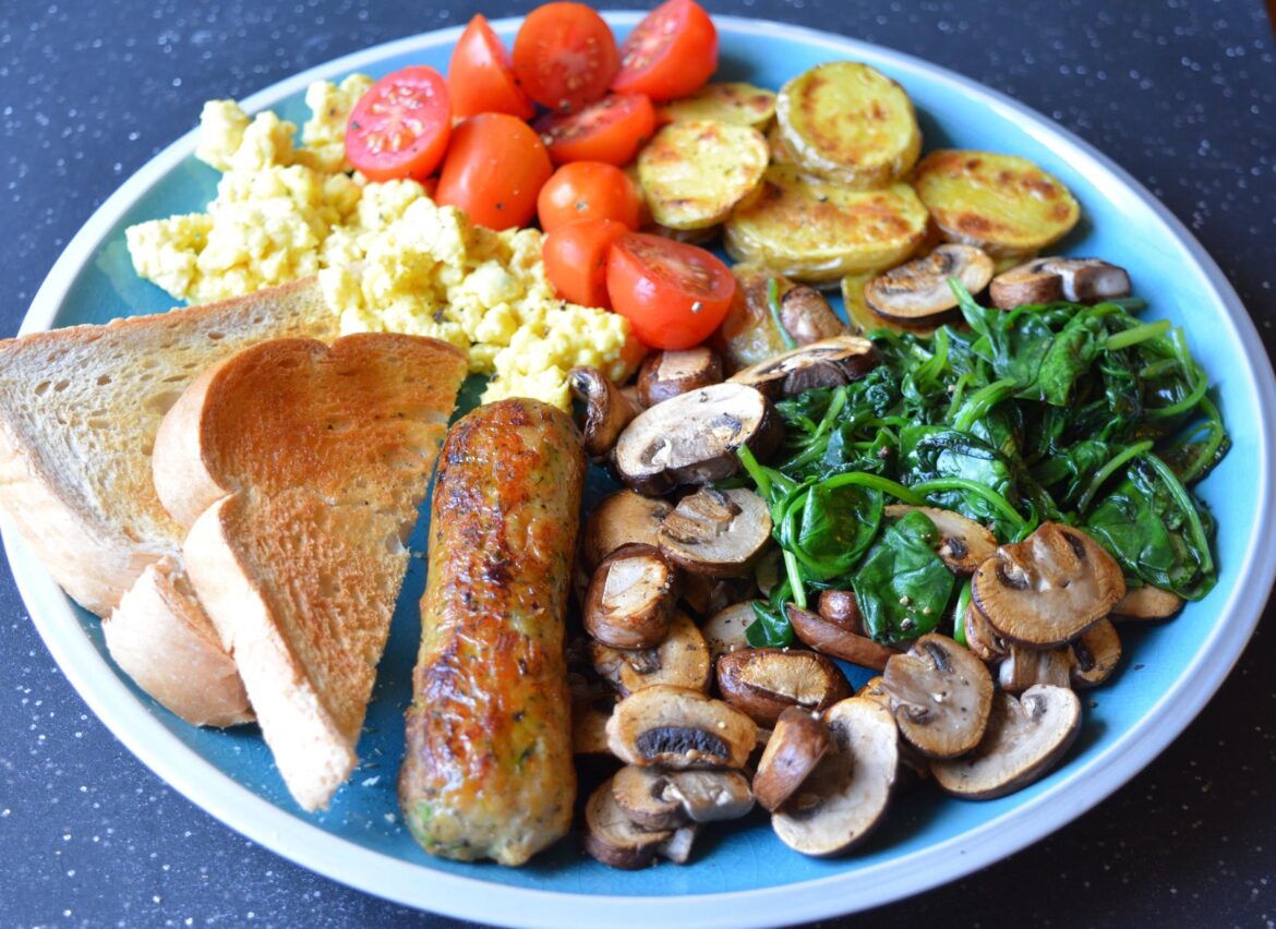 (384 cal, 34 P ) breakfast for dinner - pesto Beyond sausage, Just Egg, toast, tomatoes, potatoes, spinach, mushrooms