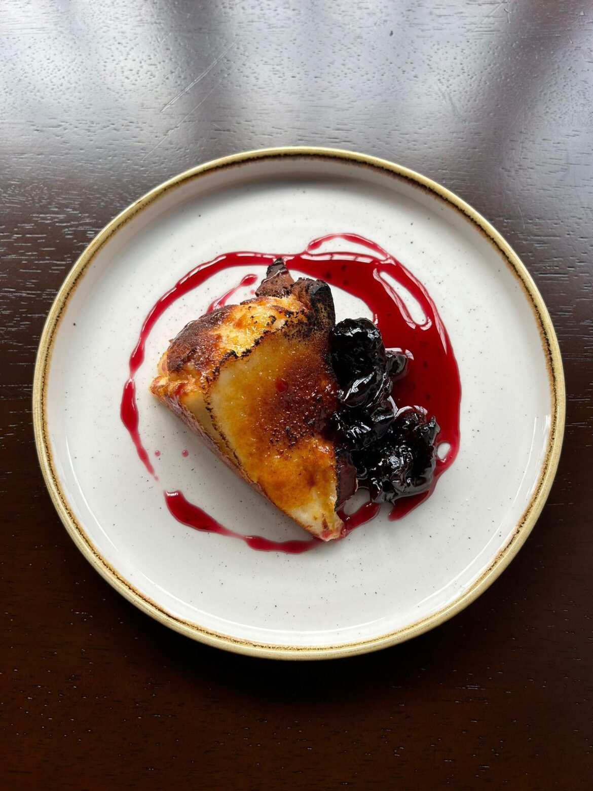 Basque cheesecake and cherry compote