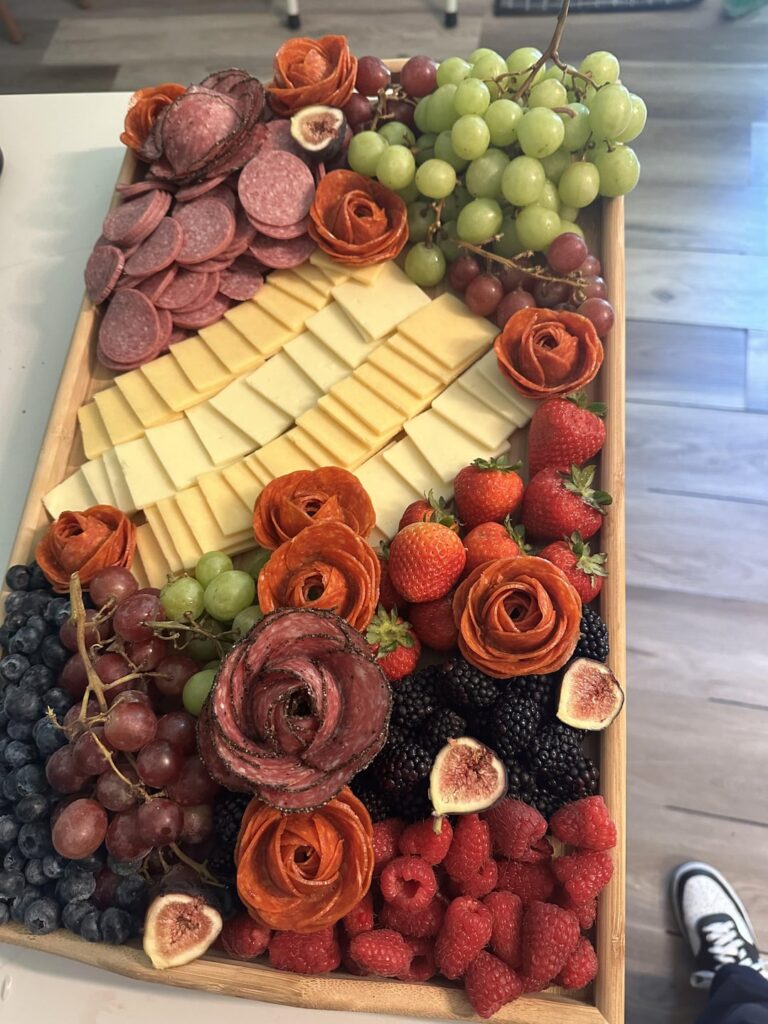 I’ve been looking at everyone’s pretty boards on here, and it inspired me to make one for a memorial I was attending today .  Ran out of room for crackers had to put them on the side :)