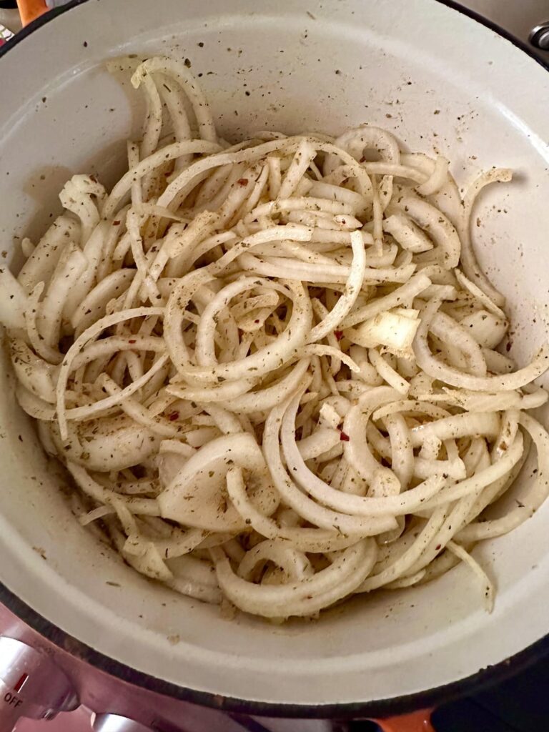 Made an original Italian classic dish for dinner tonight: “Worms N Dirt” (featuring 5 large onions)