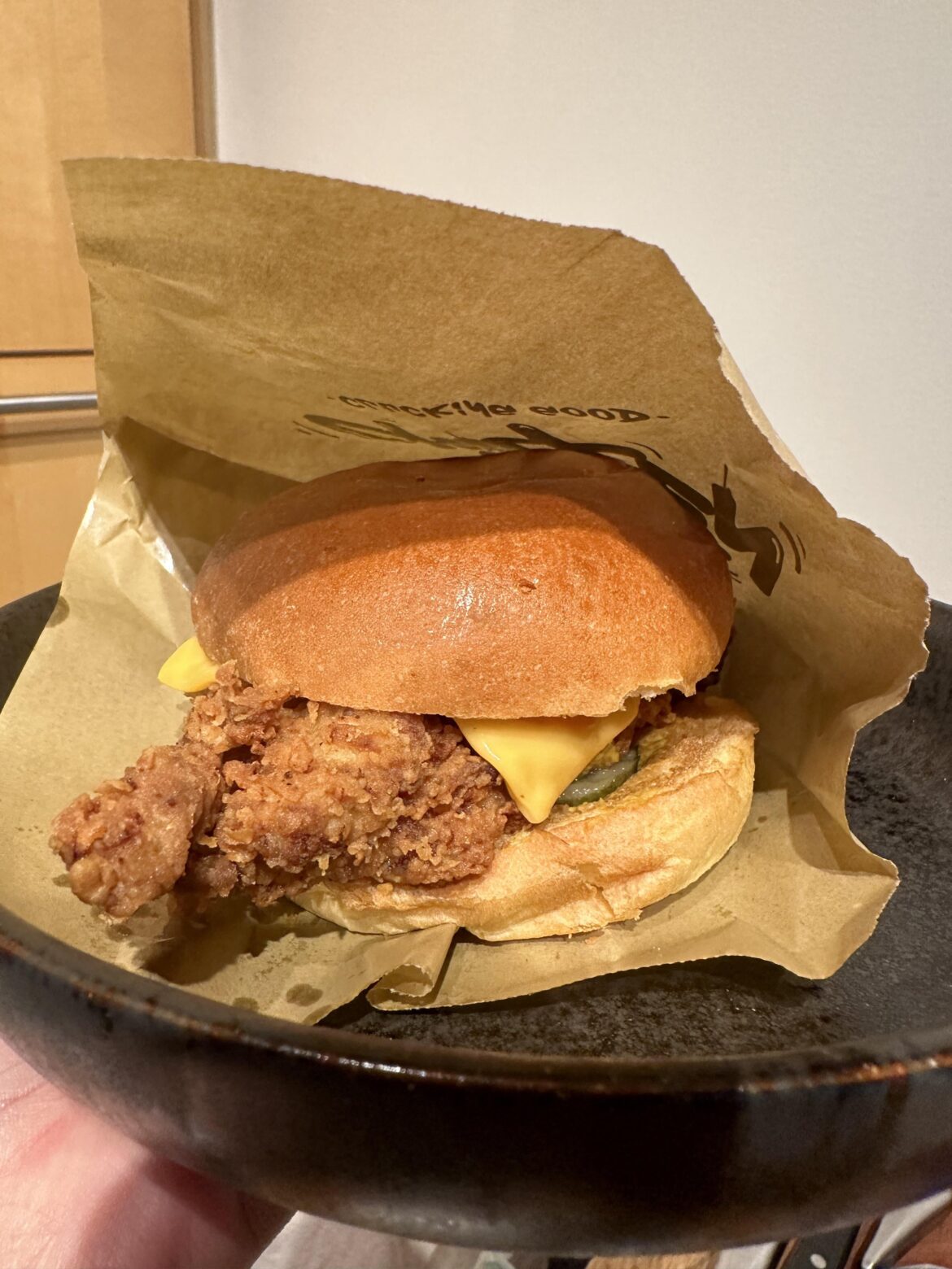 Fried chicken sandwich, cheddar cheese, sauce and sweet pickles