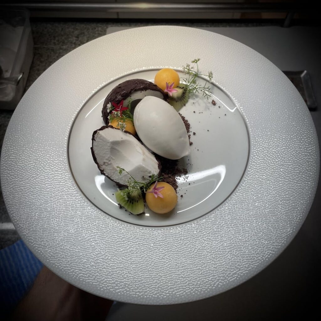 Coconut Parfait. Dark Chocolate. Coconut & Lime Sorbet. Chocolate Soil. Fruit.