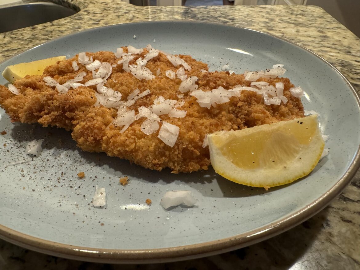 Pollo empanizado, fried chicken, schnitzel, whatever you want to call it. Added more onions after the pic, can have too little but never too much onions it seems.