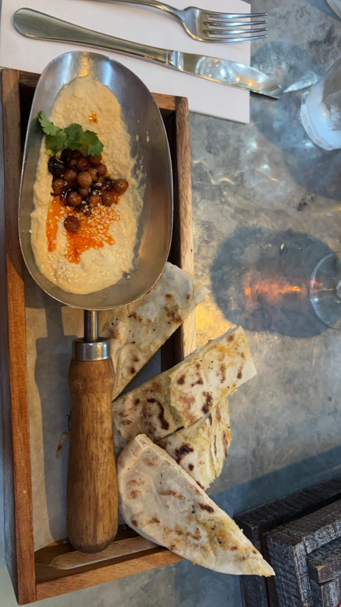 Hummus served from a Trowel