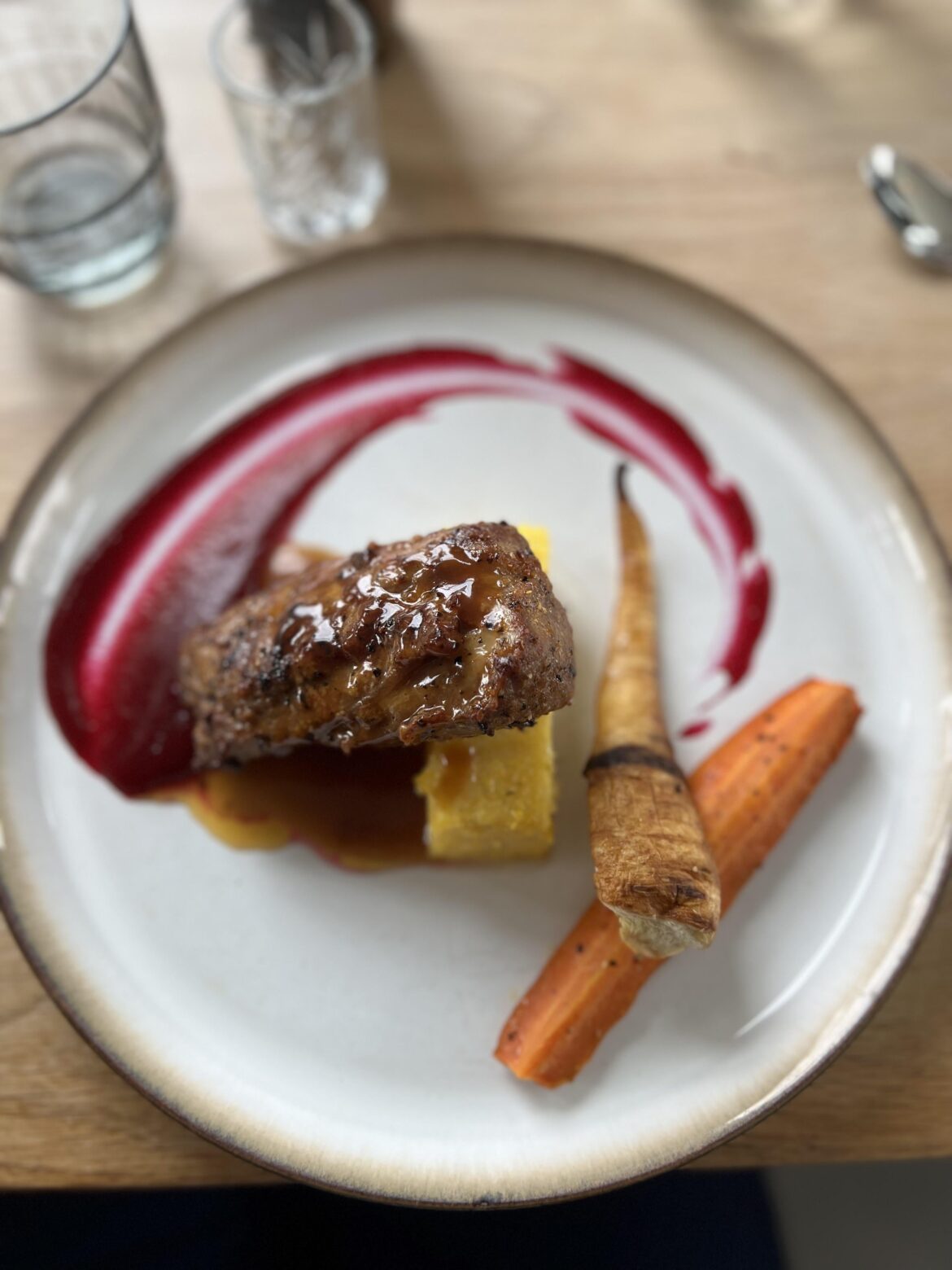 Buttered Lamb, polenta, carrot with a beet purée