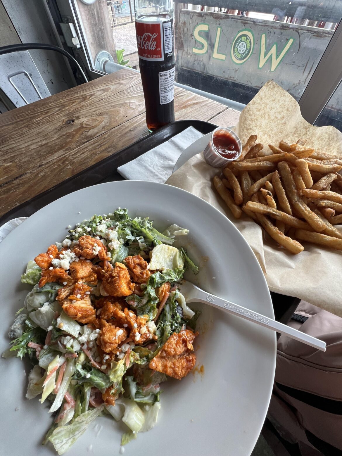 The buffalo chicken salad at the Oasis Brewery has no business being as good as it is