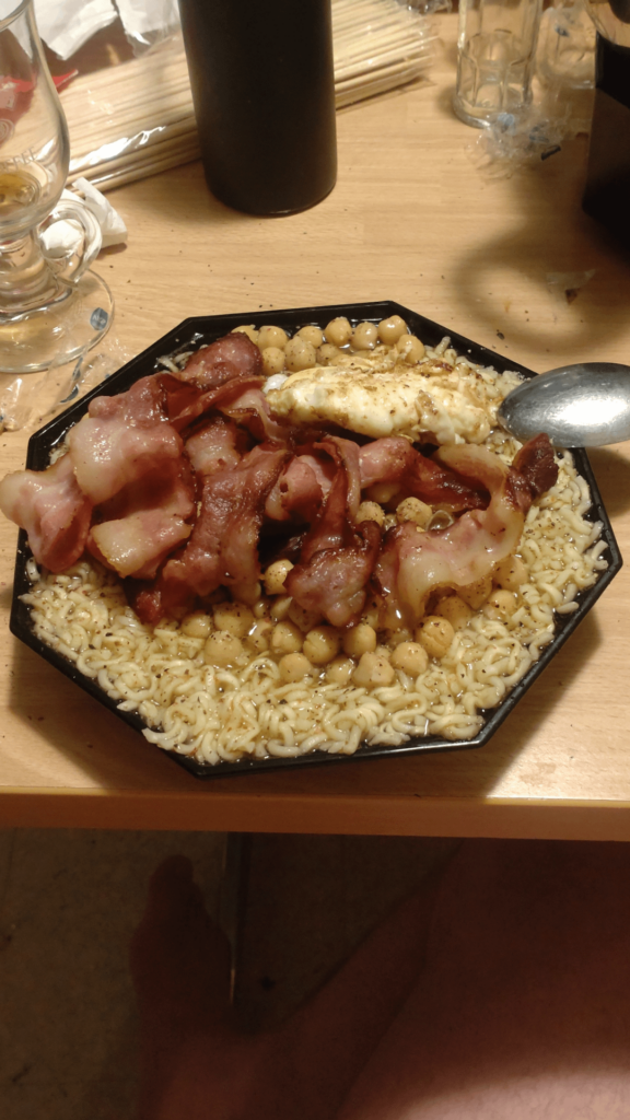Ramen, chickpeas, bacon and egg. With 5 peppers on.