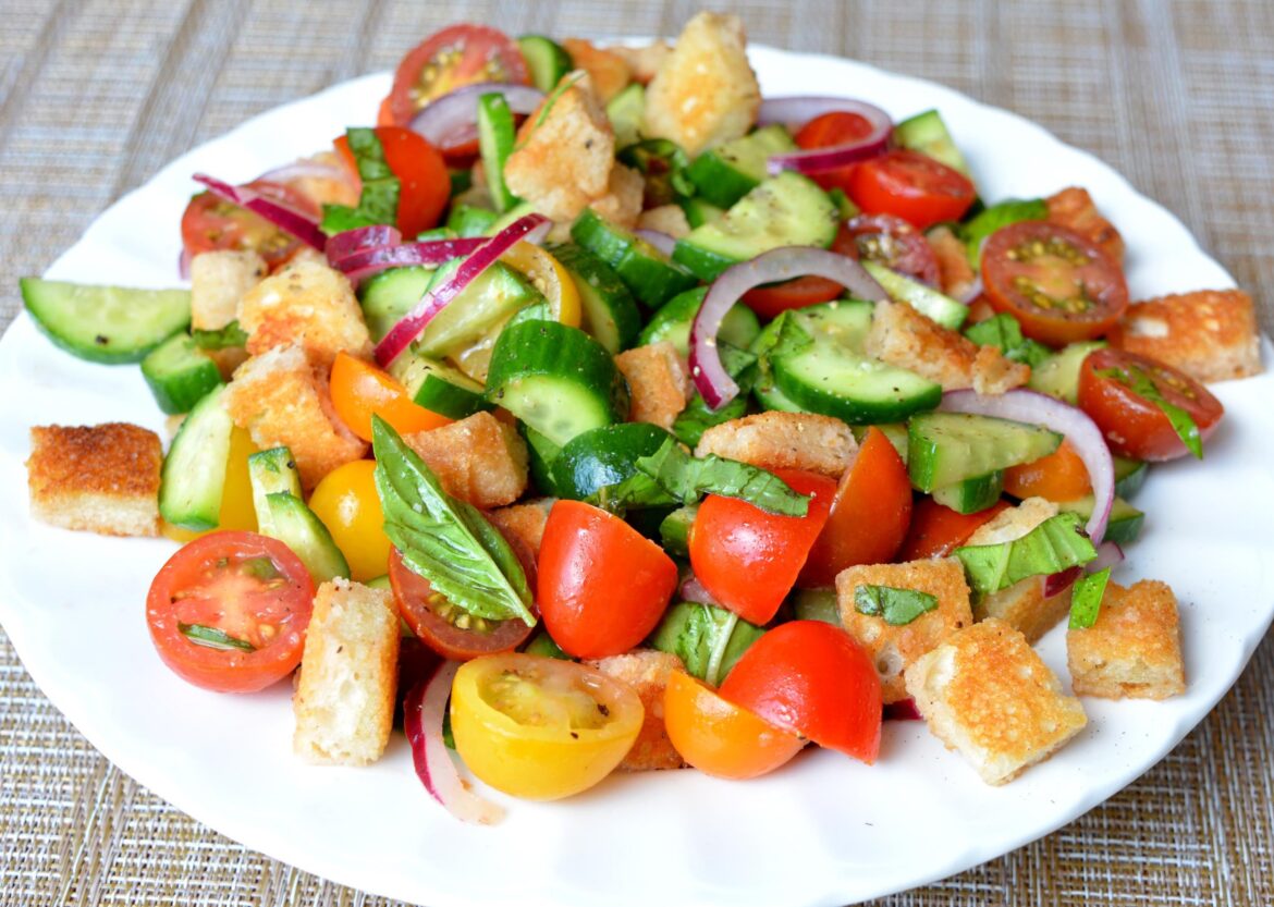 (275 cal, 23 P) Panzanella (Tuscan bread salad) is such a great high volume snack. Use keto bread for extra protein.