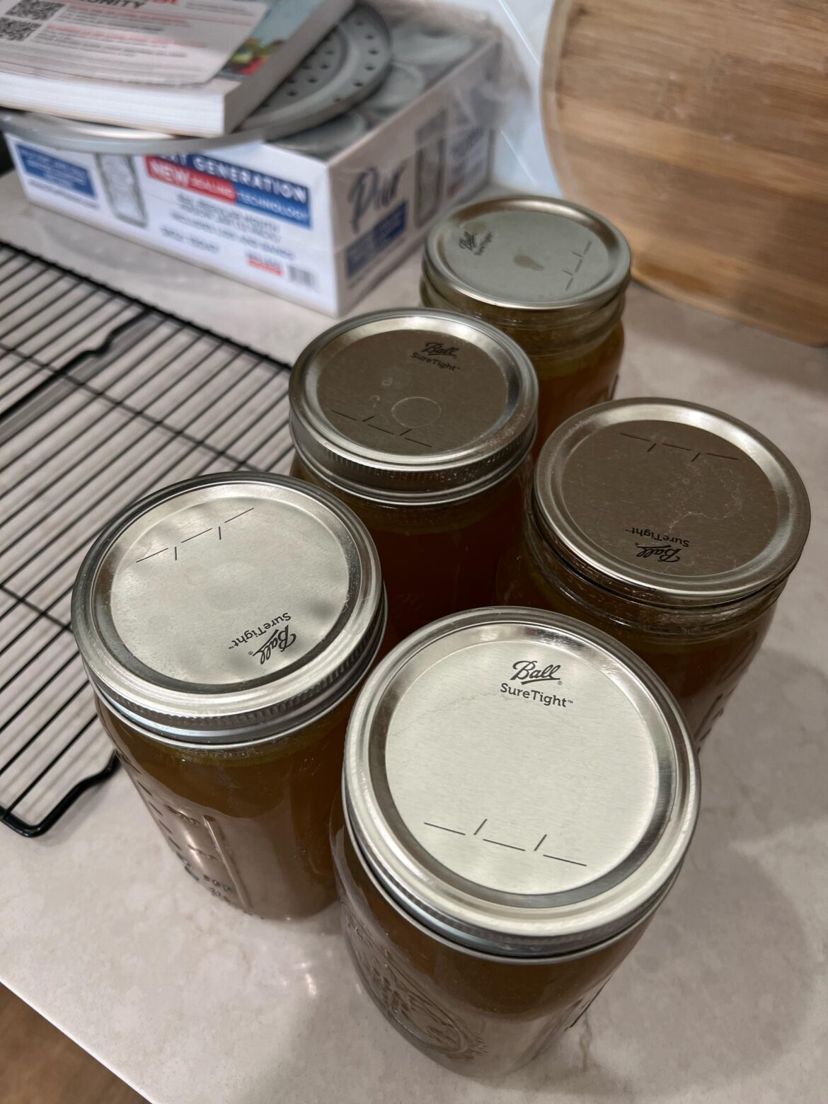 Processed chicken stock yesterday and may not understand what fingertight means in the context of canning.