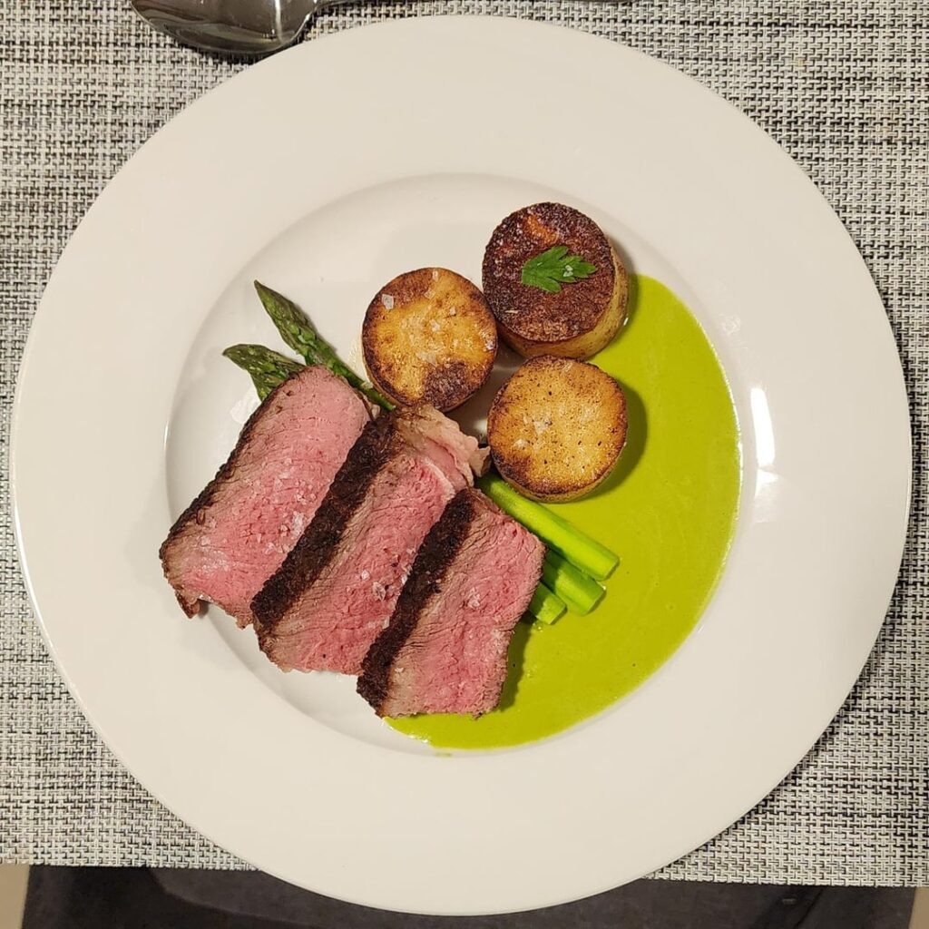 Grilled ribeye, fondant potato, asparagus, chimichurri sauce. Ver. 2.
