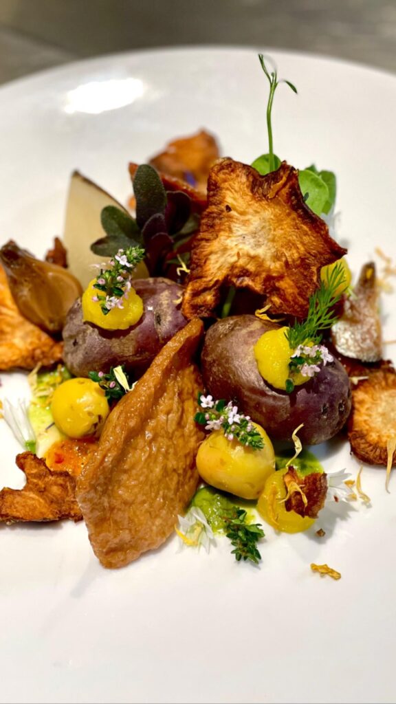 Venison mousseline in soy curd wrappers on autumn vegetables