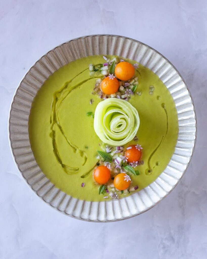 Melon Gazpacho with Honeydew, Tomato, Cucumber, Jalapeño, Red Onion, Chive Blossom, Verbena, and Olive Oil