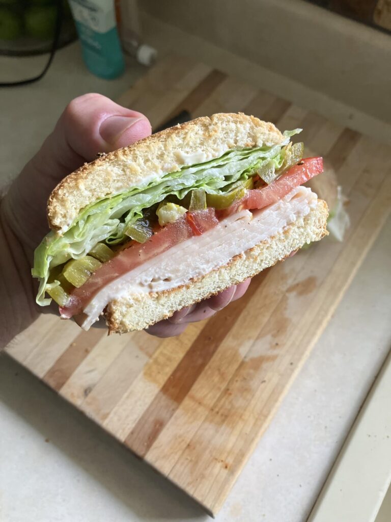Turkey, garden tomatoes, lettuce, pickled jalapeños & mayo.  With an Arnold Palmer