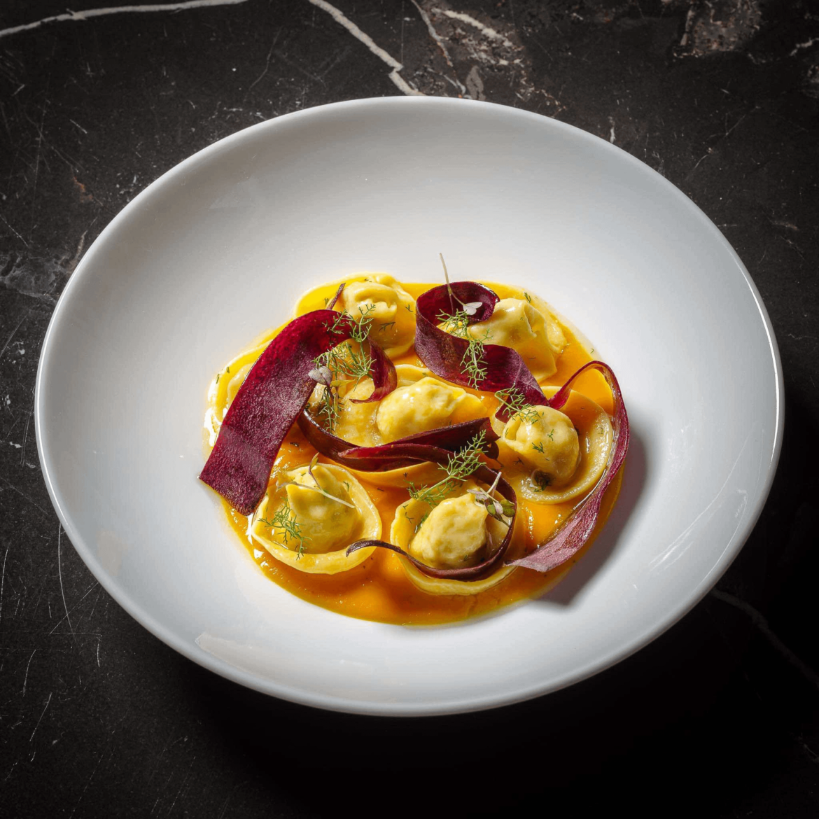 Tortellini stuffed with rabbit and mallow.