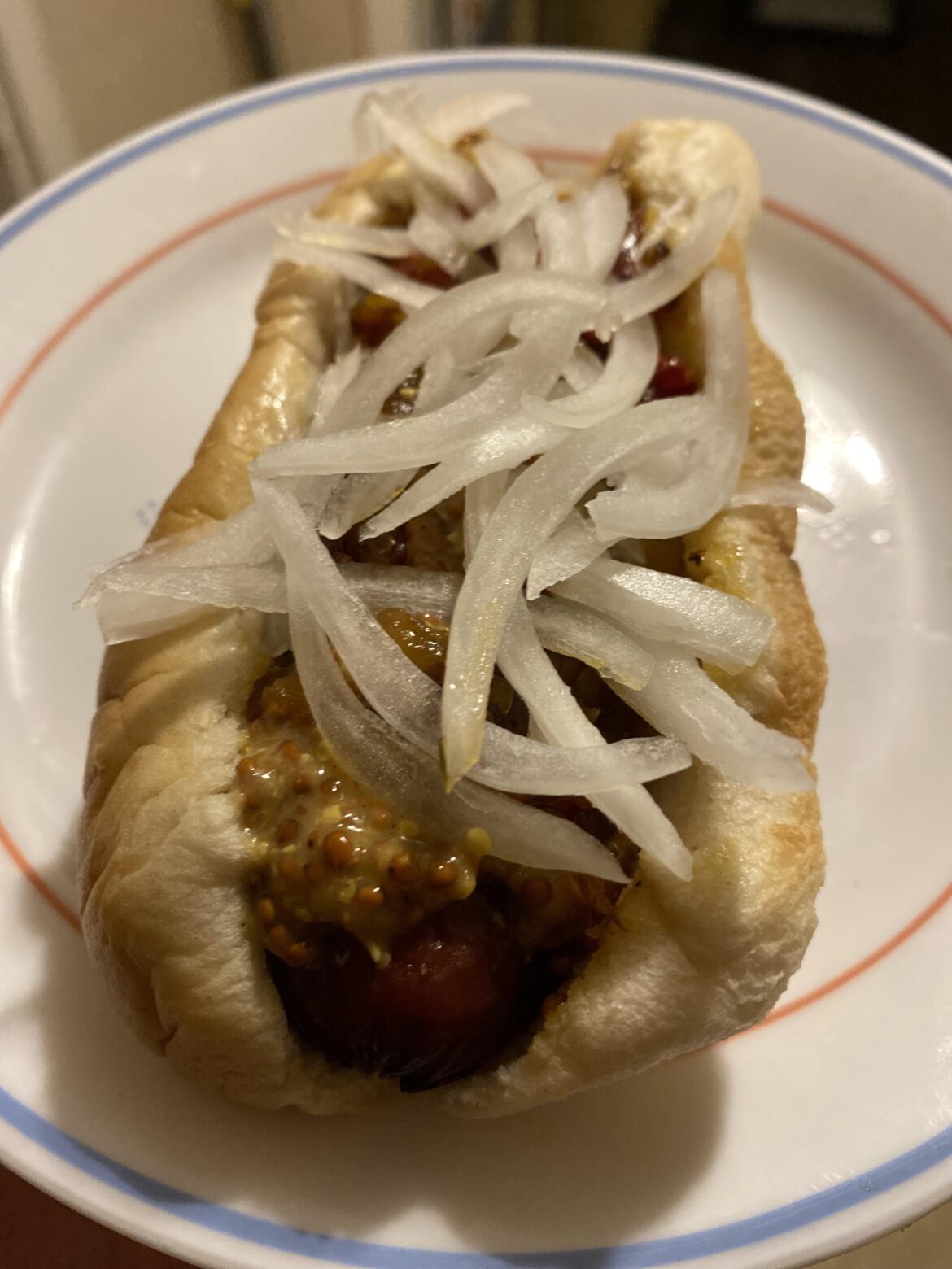 Caramelized onions, peppers and garlic, topped with stone ground mustard and raw onions