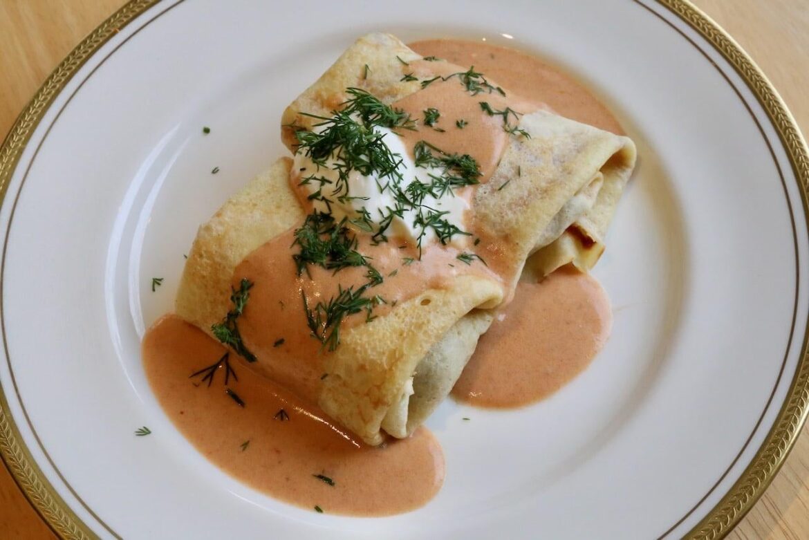 As cool weather arrives in Autumn here's one of my favourite recipes to cook on a chilly day. Hortobagyi Palacsinta are Hungarian Meat Stuffed Crepes, slathered in a creamy paprika sauce. The perfect comfort food!