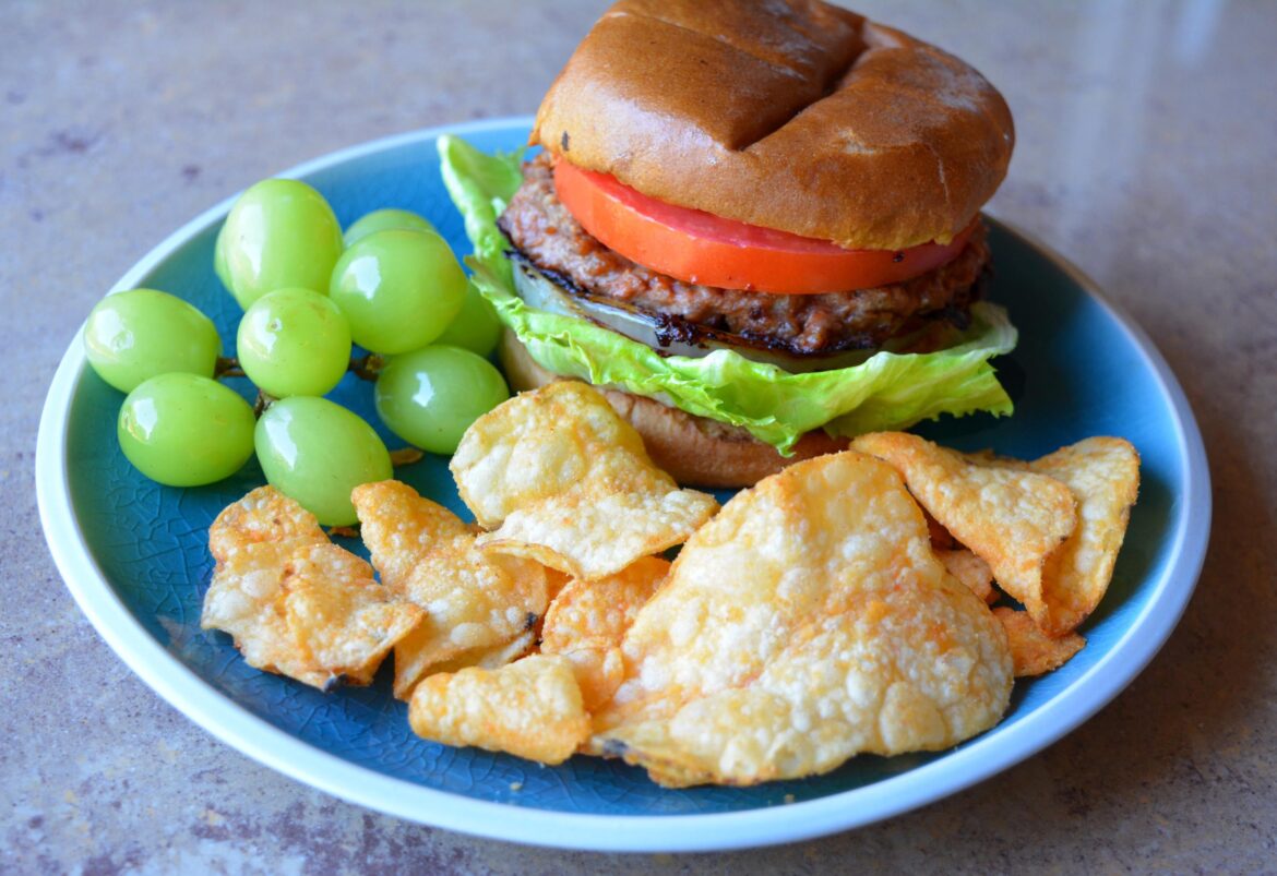 398 cal lunch (28 g protein) Low cal kettle chips (see comments) and Beyond burger with grapes.