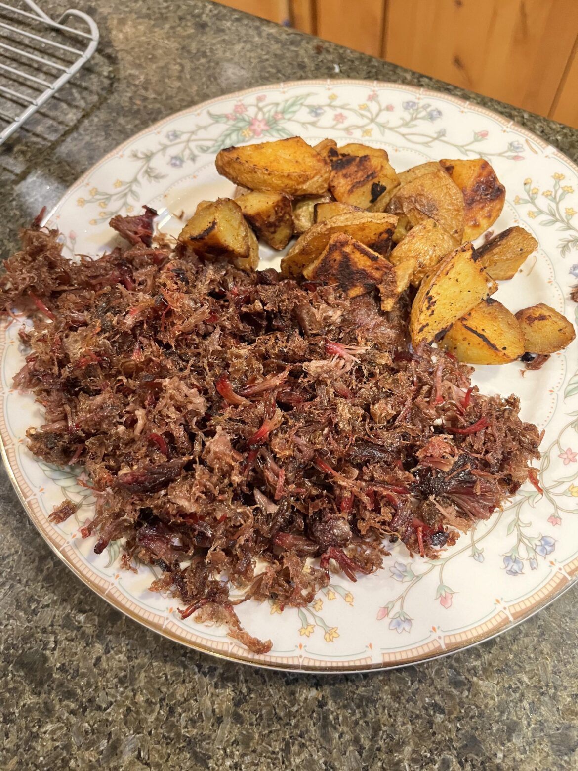 I smoked a pork shoulder yesterday. Turned the leftovers into crispy carnitas today. So good.