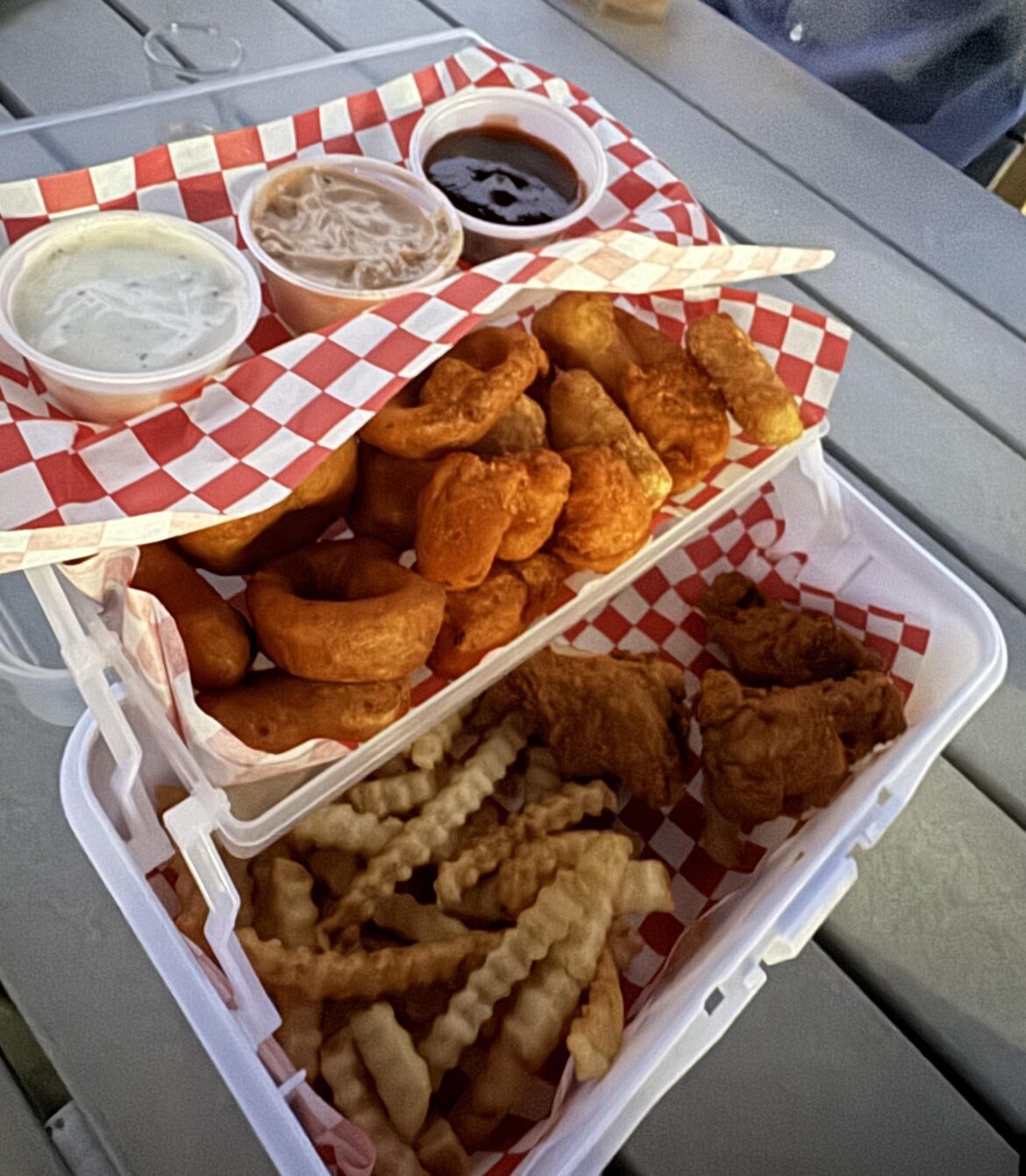 Appetizer sampler served in a tackle box