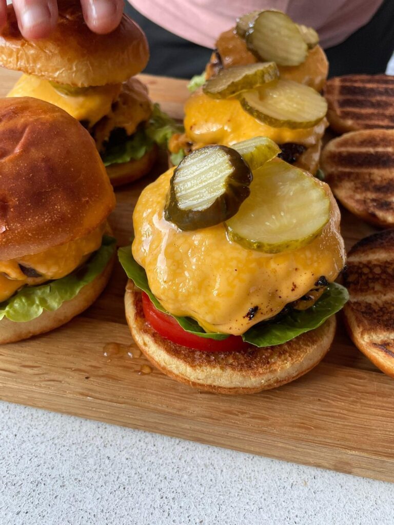 Burgers w/ grilled peach & tomato salad