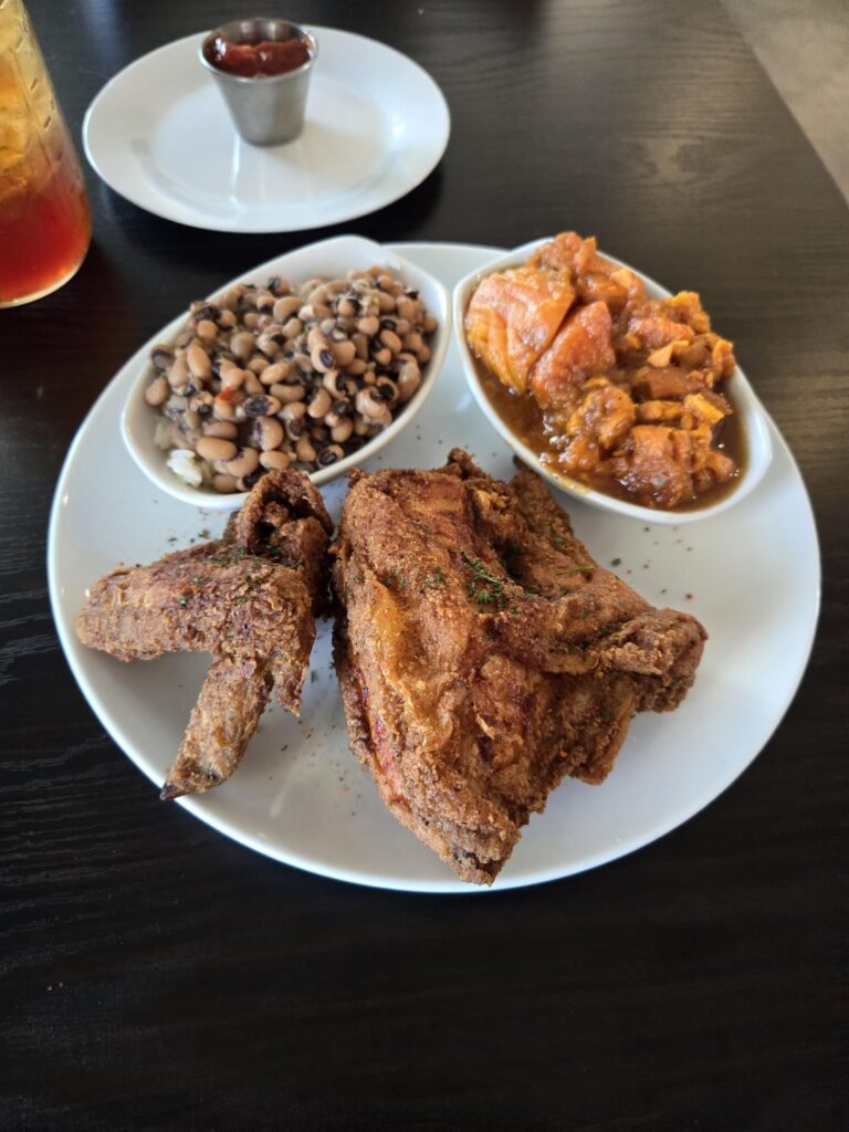 Fried chicken, candied yams, and black eyed peas from Dulan's on Crenshaw