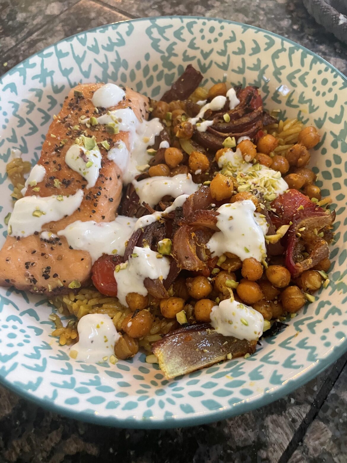 Schwarma spiced chickpea bowls with added customized salmon.