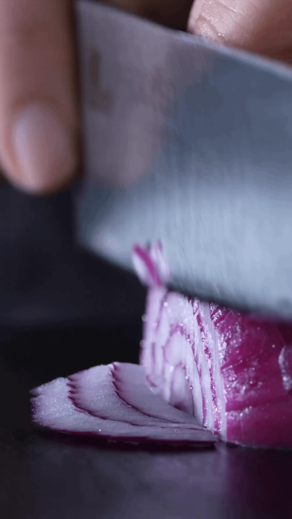 Onion getting chopped.