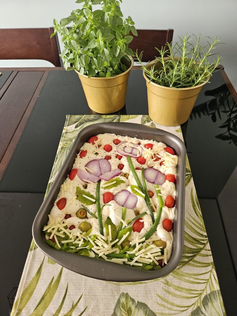 Inspired by the artistic focaccias posted here, this is our attempt: