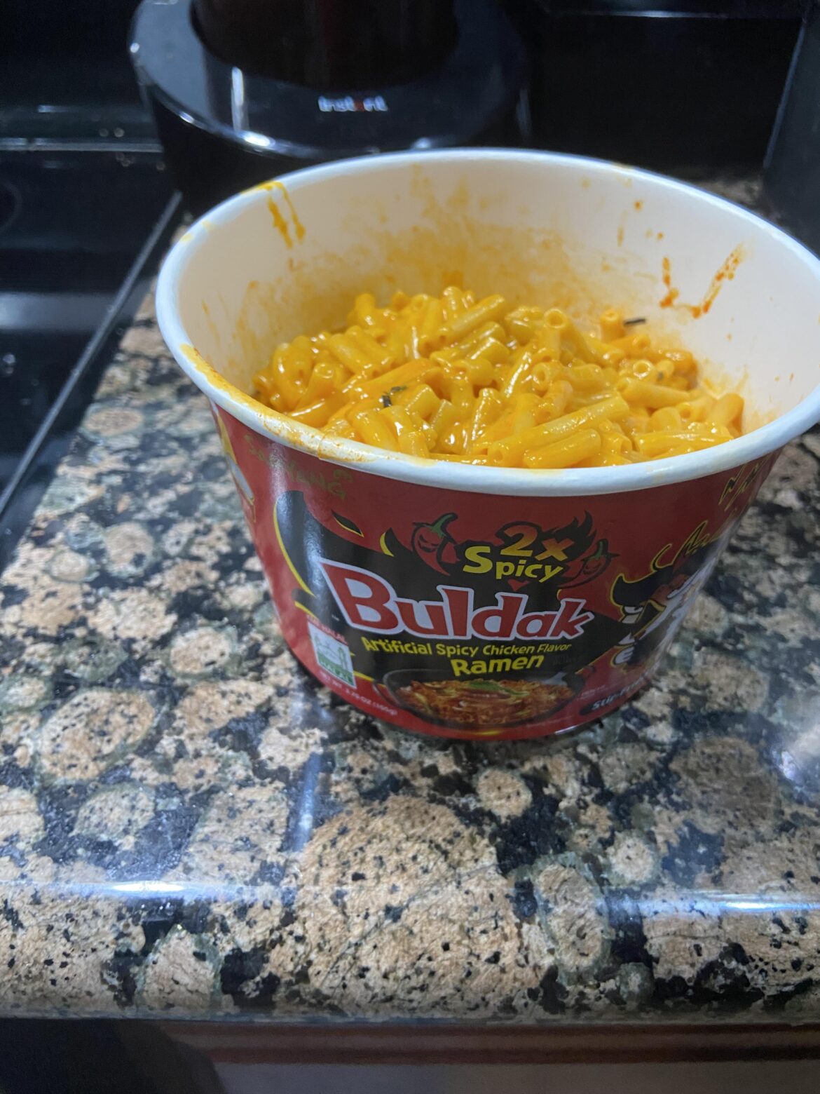 I got super high and threw the buldak 2x spice  packets into mac and cheese.